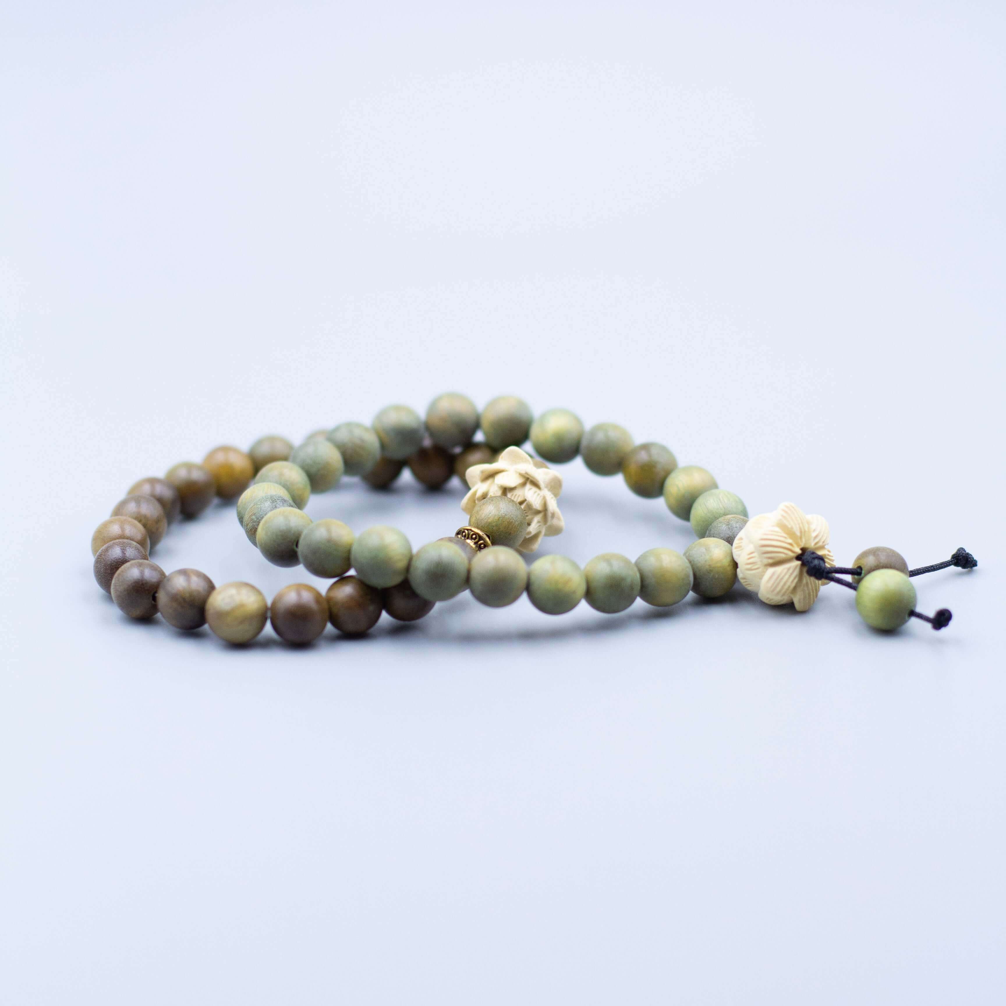 Peaceful Lotus Bracelet-For Inner Peace in light green featuring lotus symbol for purity and wisdom, offering inner peace and spiritual enhancement.
