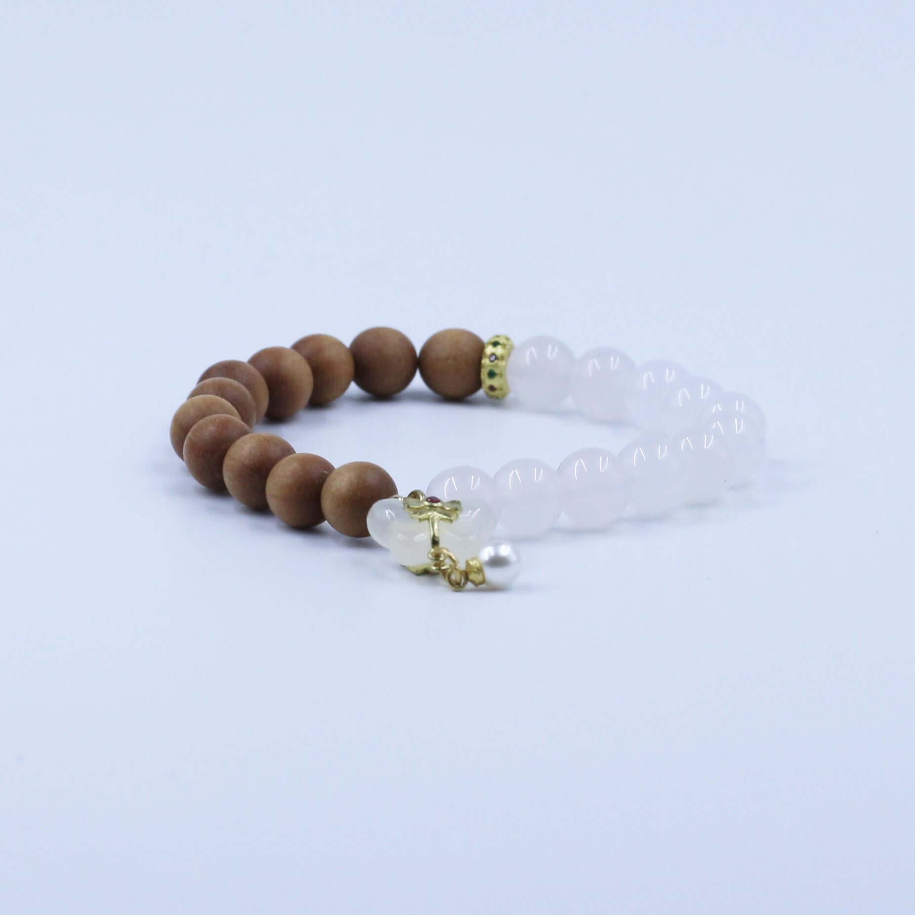 Double Purifying Butterfly Tassel Bracelet with sandalwood beads for clarity and new life feng shui accessory.